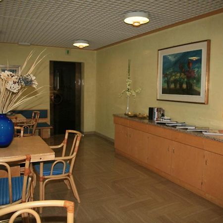 Albergo Benito Понте-нель'Альпі Екстер'єр фото